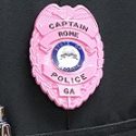 Rome Police wearing pink badges for Breast Cancer Awareness Month